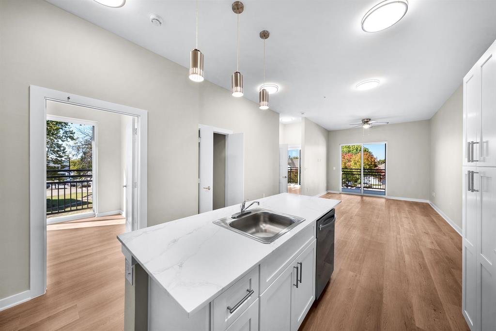 3522 Main Street, Unit 212 Rowlett, TX 75088 - Photo 25 of 25 a large white kitchen with a large window