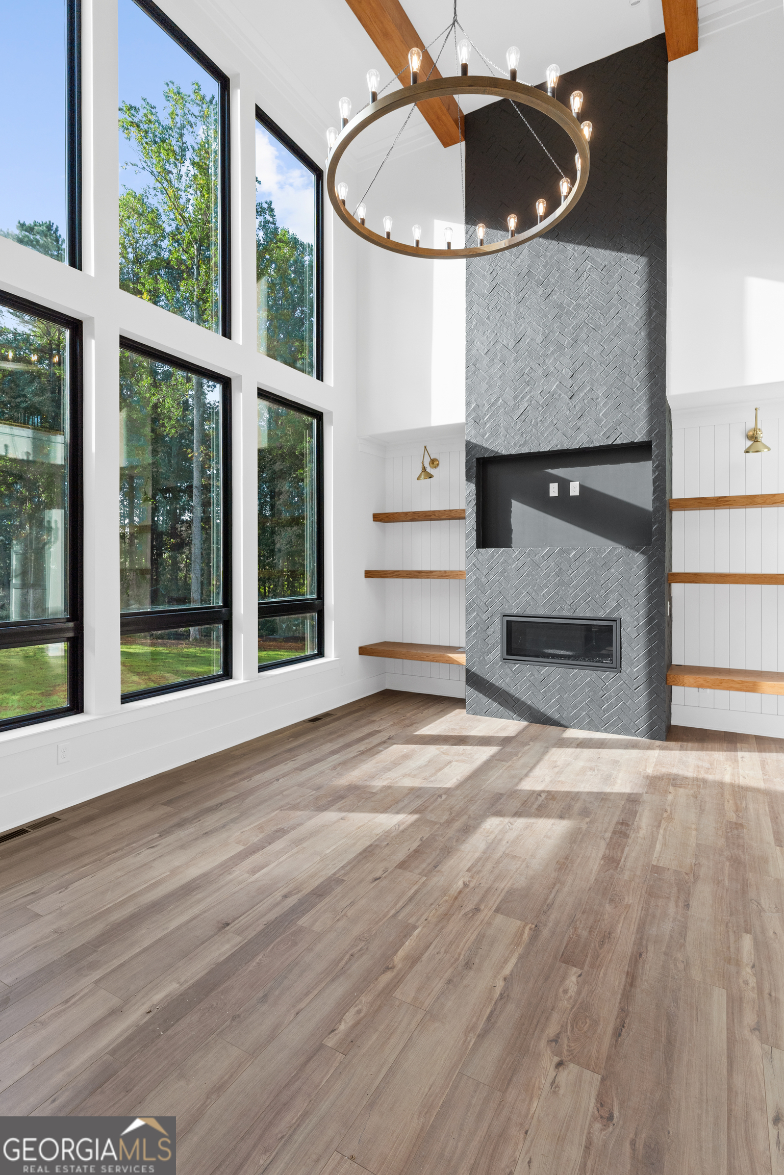Lot 1 Cox Road Roswell, GA 30188 - Photo 13 of 38 a view of a livingroom with wooden floor and a large window