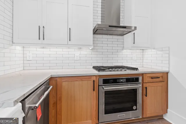 a front view of a house with wooden floor