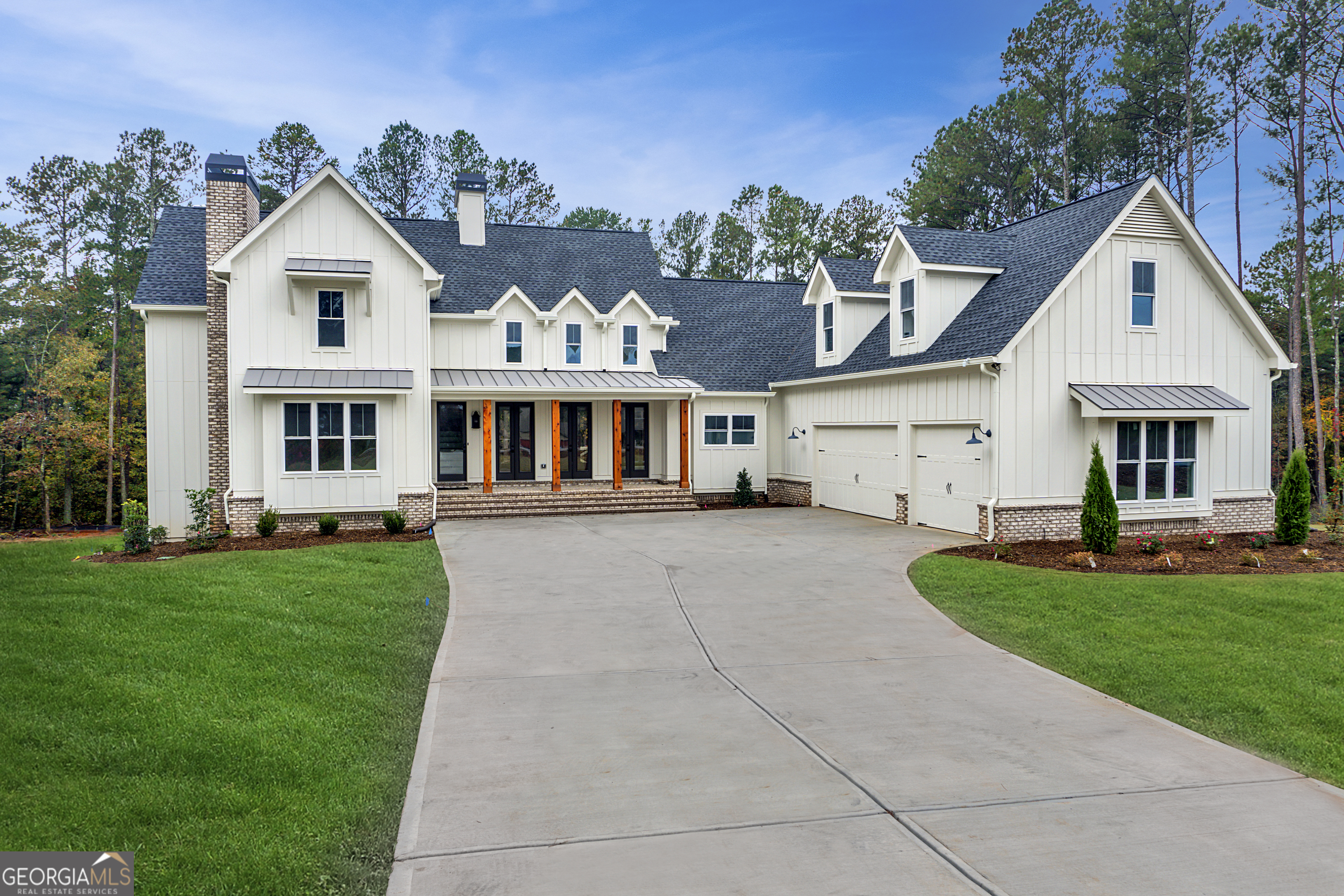 Lot 1 Cox Road Roswell, GA 30188 - Photo 25 of 38 a front view of a house with a garden