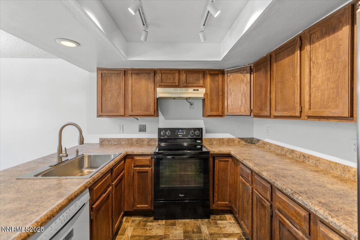 1090 Hartford Court Reno, NV 89503 - Photo 13 of 45 a kitchen with a stove and a sink