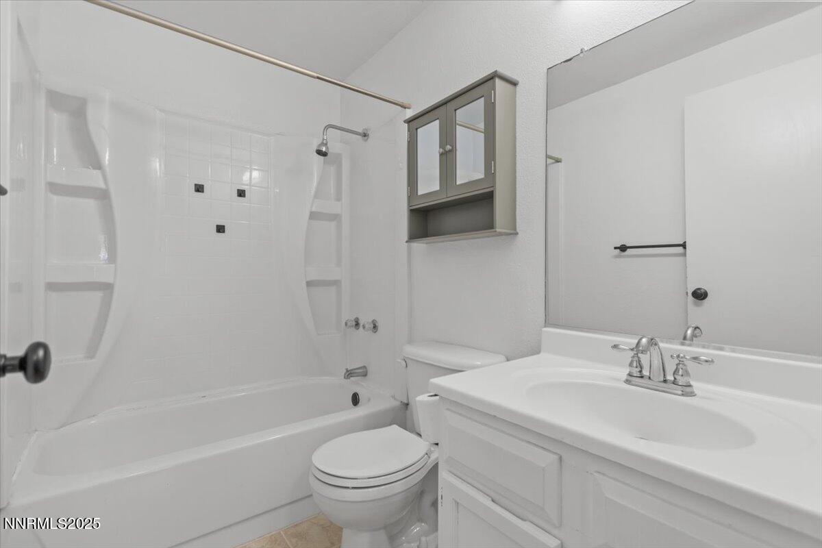 1090 Hartford Court Reno, NV 89503 - Photo 27 of 45 a bathroom with a sink toilet and shower