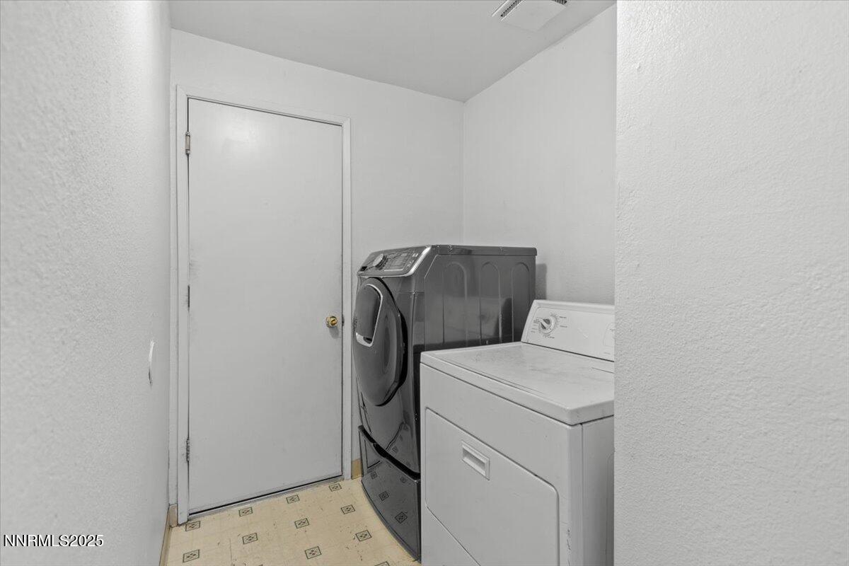 1090 Hartford Court Reno, NV 89503 - Photo 29 of 45 a utility room with dryer and washer