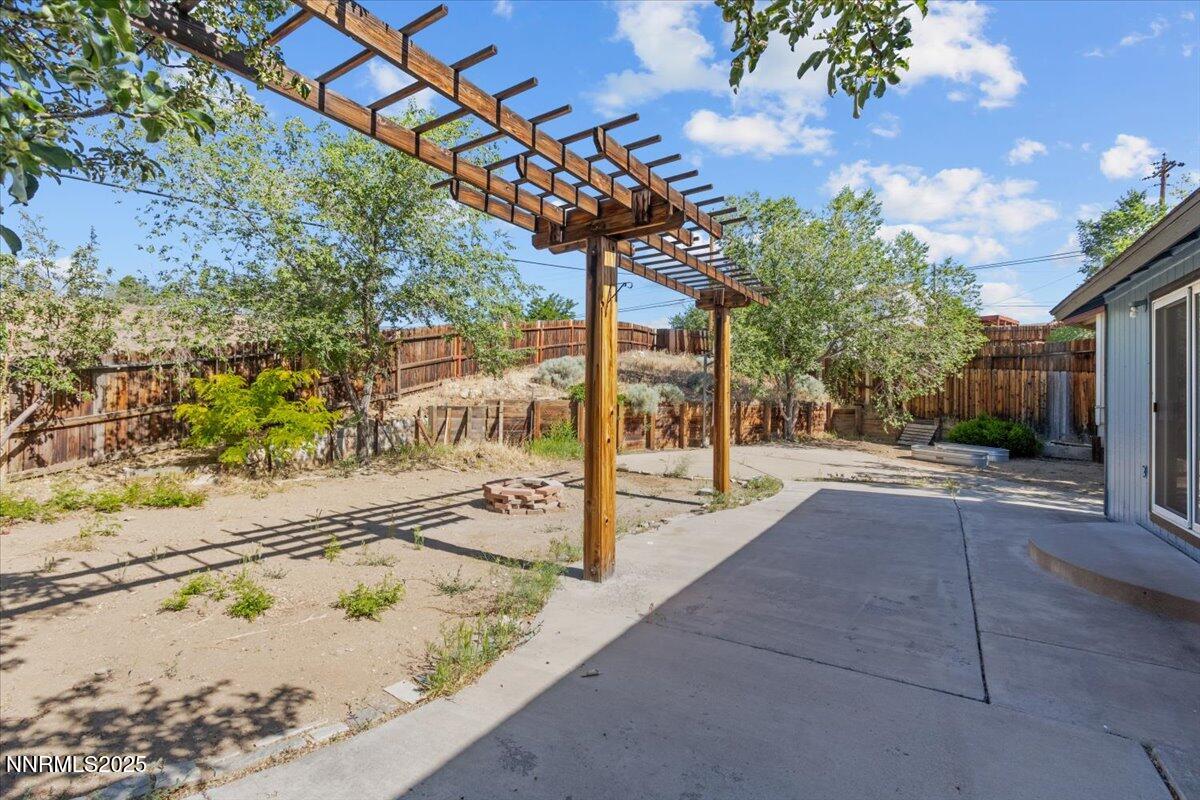 1090 Hartford Court Reno, NV 89503 - Photo 31 of 45 a view of a porch with a tree