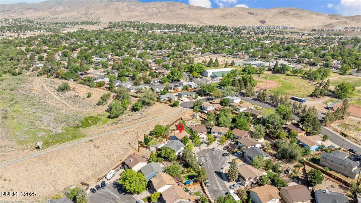 1090 Hartford Court Reno, NV 89503 - Photo 36 of 45 an aerial view of residential houses with outdoor space