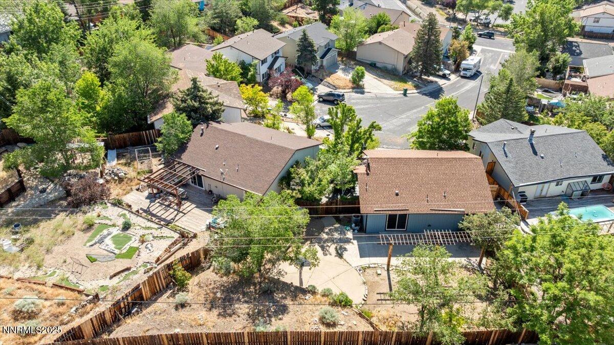1090 Hartford Court Reno, NV 89503 - Photo 39 of 45 an aerial view of a house with yard and parking