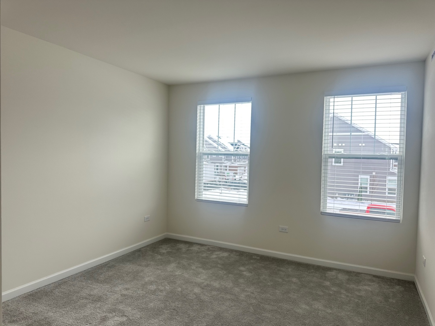5922 Hawkweed Drive Plainfield, IL 60585 - Photo 13 of 19 an empty room with a window