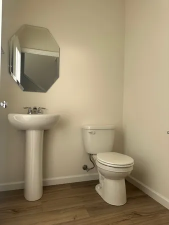 a bathroom with a sink and a toilet