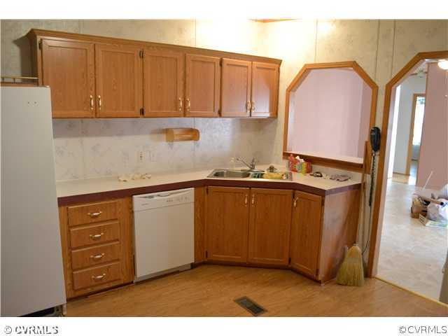 12110 Smokey Lane Rice, VA 23966 - Photo 14 of 14 a kitchen with cabinets and appliances