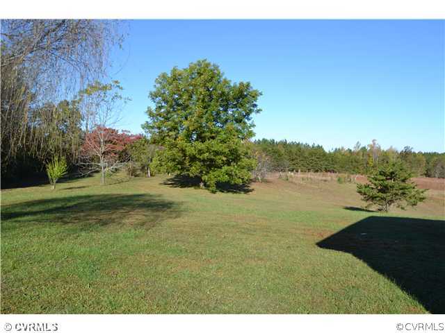12110 Smokey Lane Rice, VA 23966 - Photo 2 of 14 a view of a lake with a yard