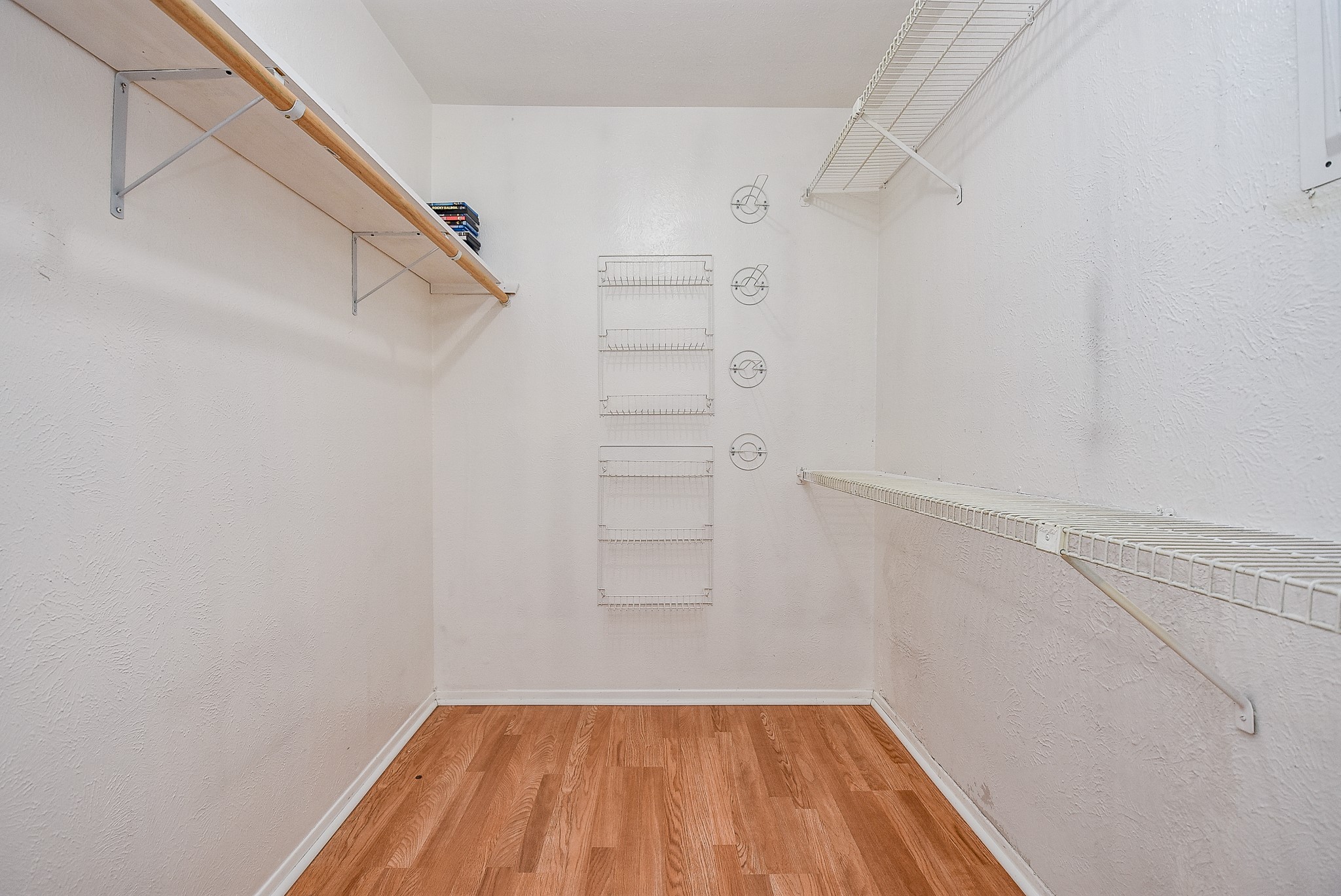 5000 Milwee Street, Unit 74 Houston, TX 77092 - Photo 24 of 35 a view of a room with racks on the wall