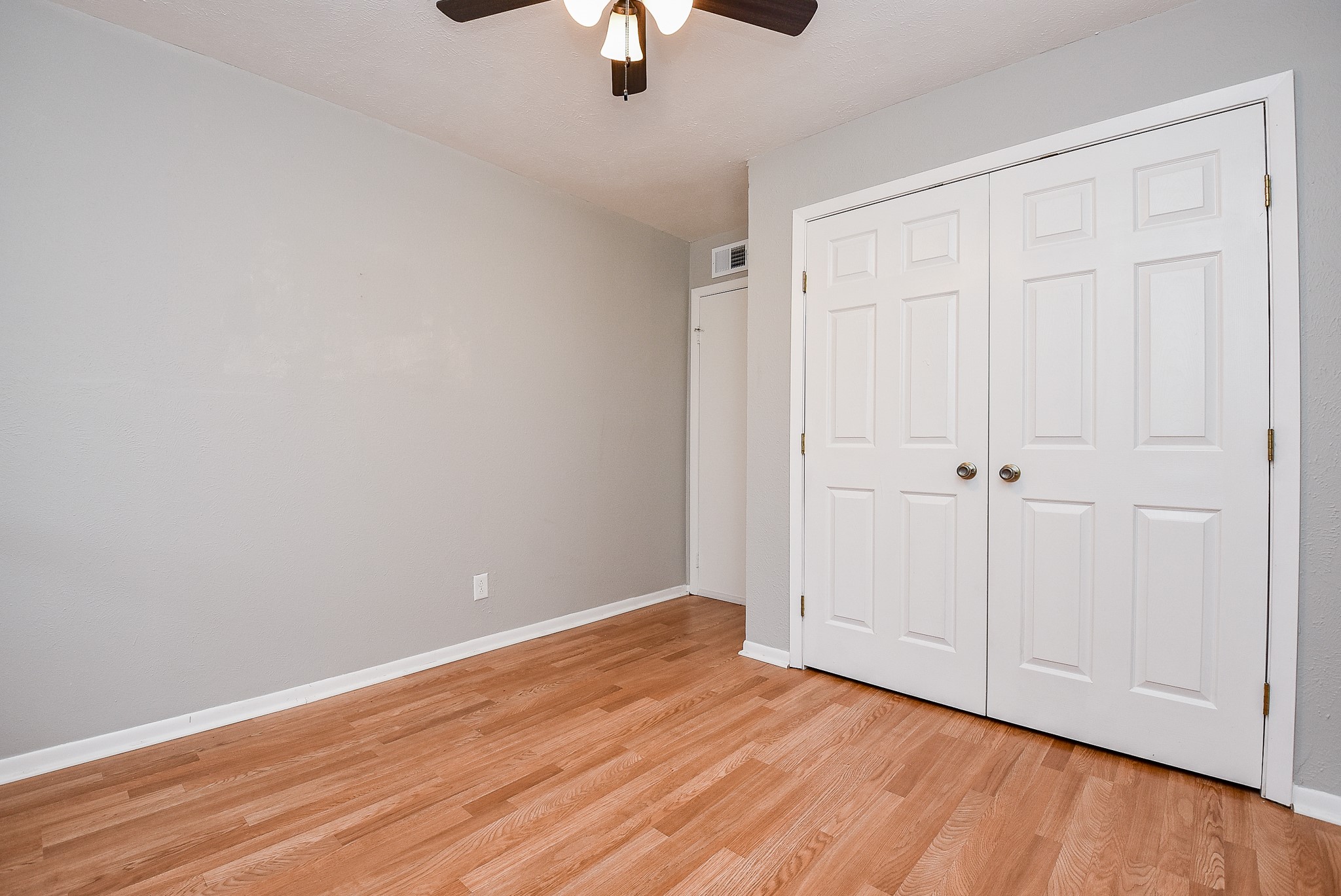 5000 Milwee Street, Unit 74 Houston, TX 77092 - Photo 28 of 35 wooden floor in an empty room