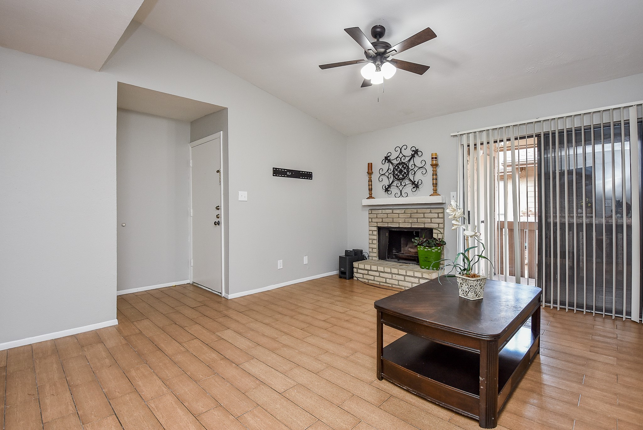 5000 Milwee Street, Unit 74 Houston, TX 77092 - Photo 4 of 35 a living room with furniture and a fireplace