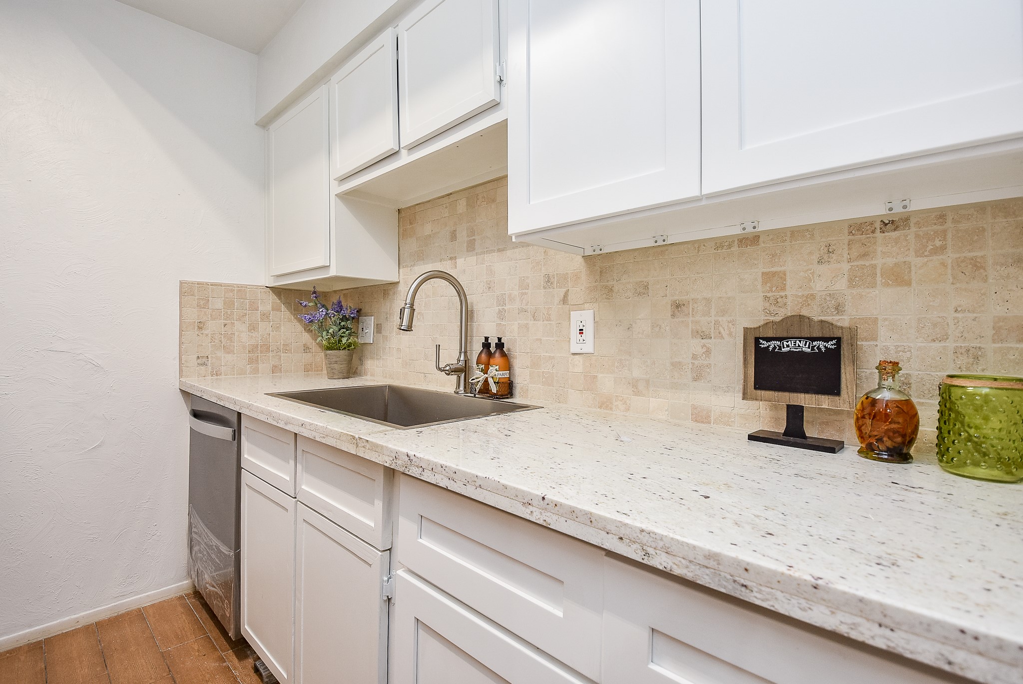 5000 Milwee Street, Unit 74 Houston, TX 77092 - Photo 9 of 35 a sink with a granite countertop window