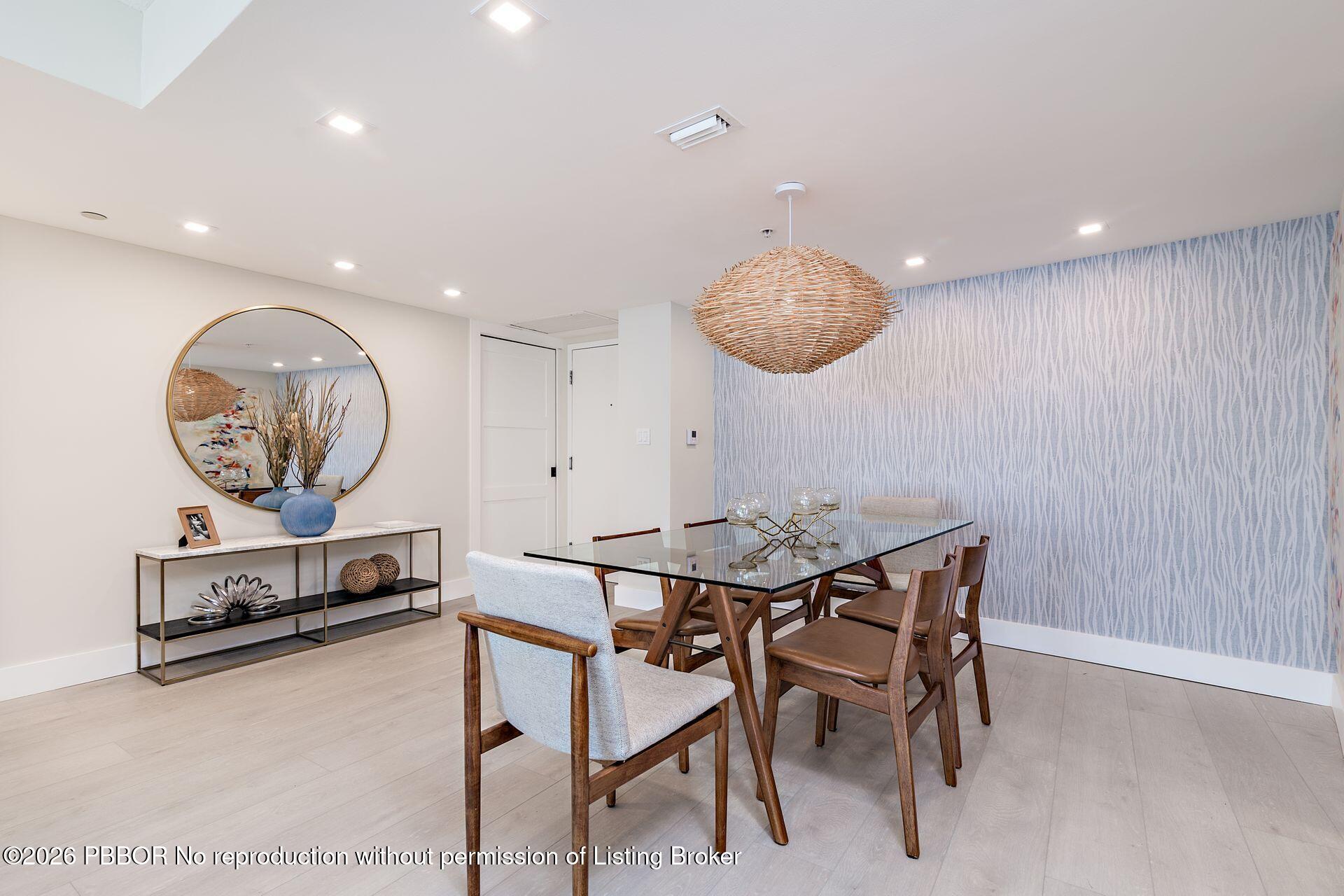 3000 North Ocean Drive, Unit 32E Riviera Beach, FL 33404 - Photo 20 of 36 a view of a dining room with furniture