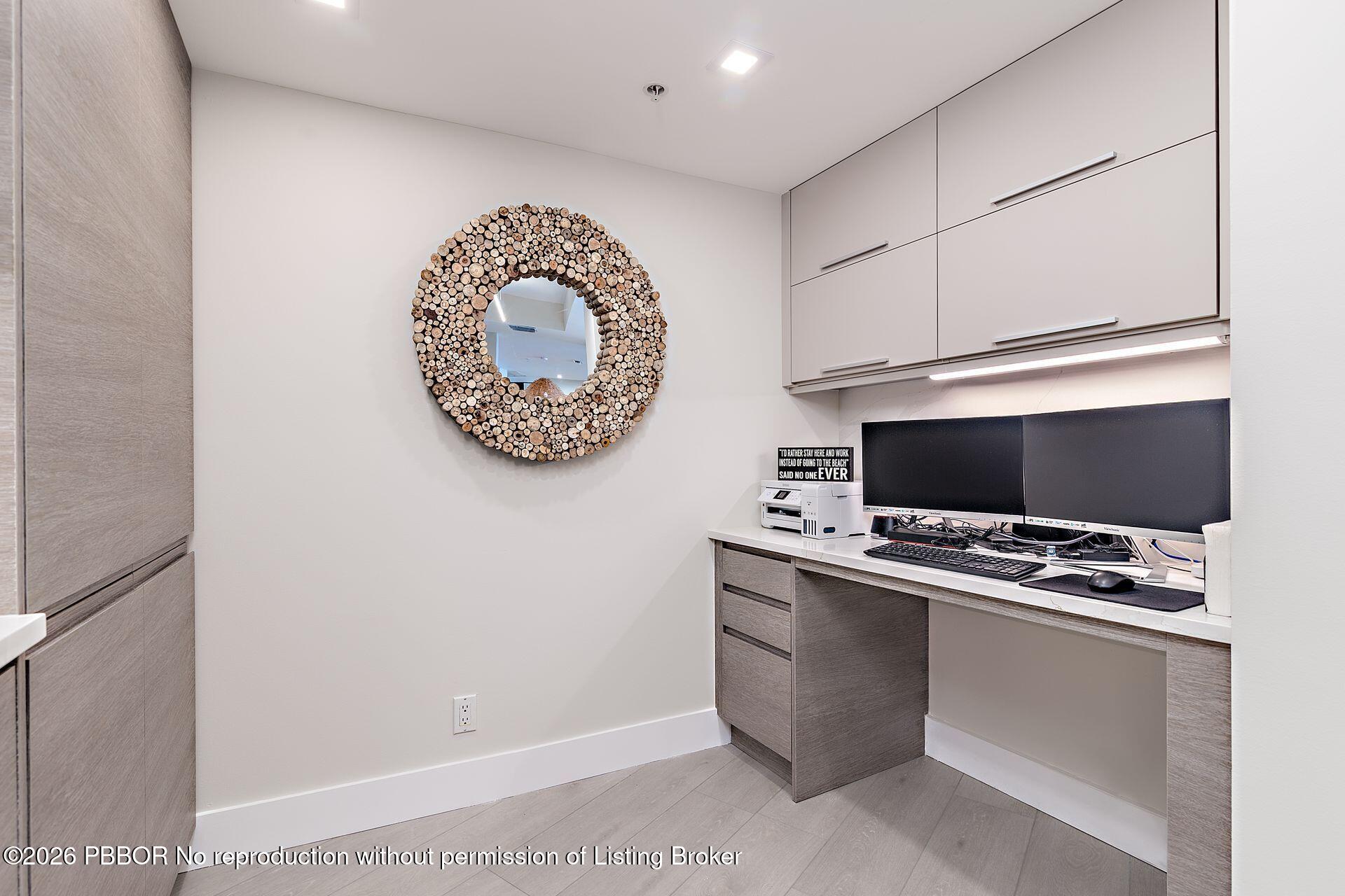3000 North Ocean Drive, Unit 32E Riviera Beach, FL 33404 - Photo 24 of 36 a workspace with furniture and window