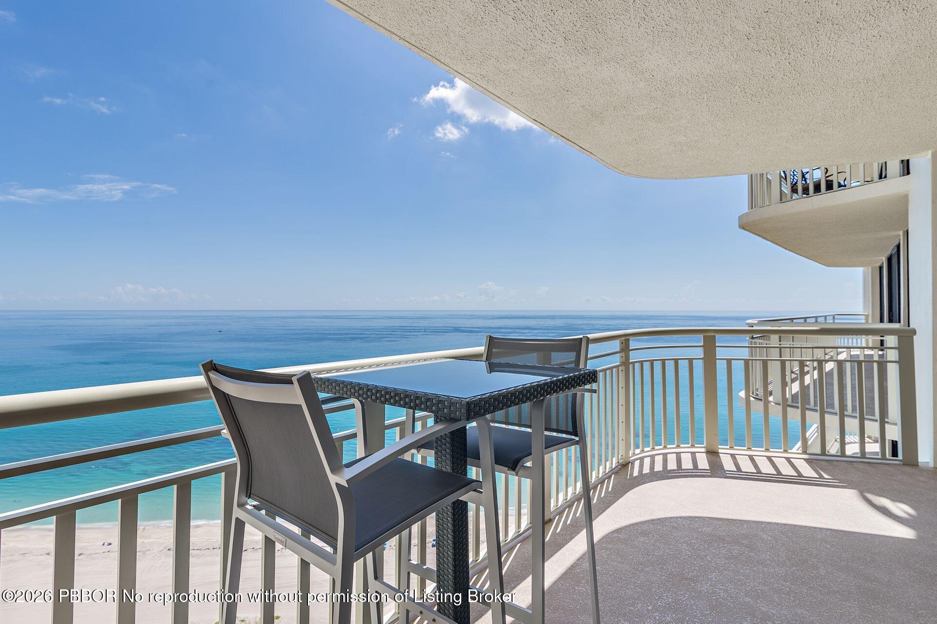 3000 North Ocean Drive, Unit 32E Riviera Beach, FL 33404 - Photo 33 of 36 a view of a balcony with furniture