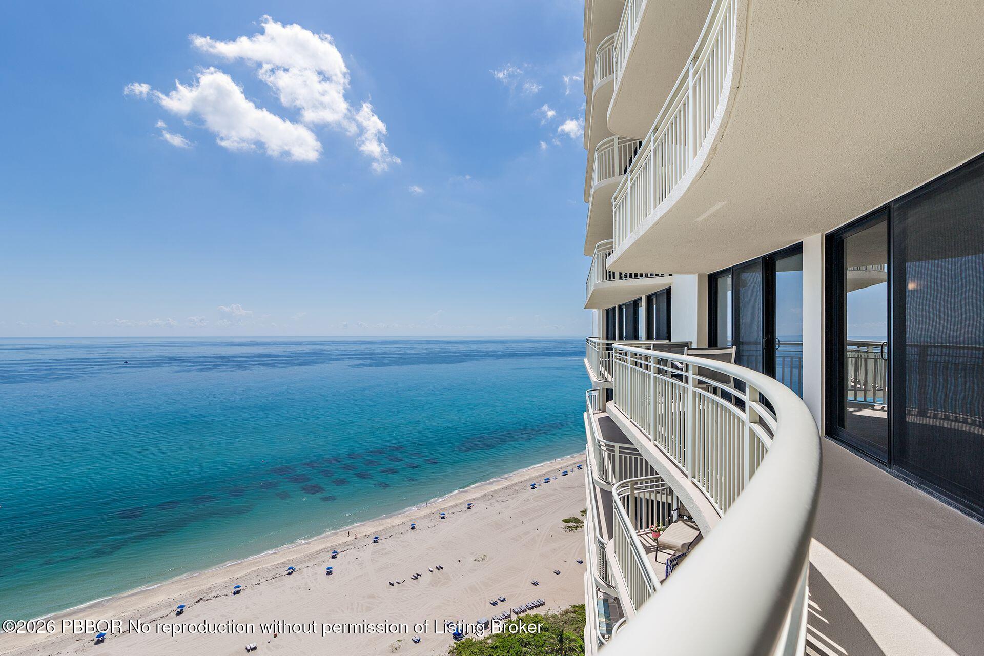 3000 North Ocean Drive, Unit 32E Riviera Beach, FL 33404 - Photo 34 of 36 a view of stairs and hall with wooden floor