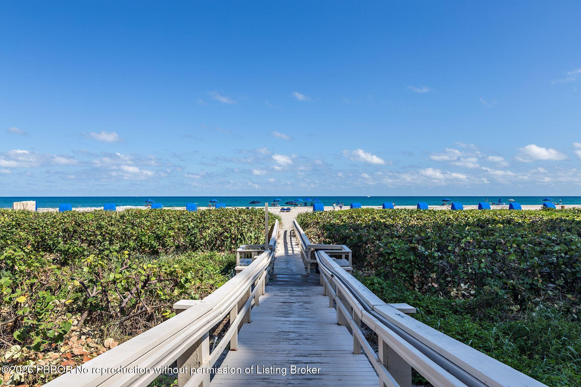 3000 North Ocean Drive, Unit 32E Riviera Beach, FL 33404 - Photo 36 of 36 a view of a balcony with wooden floor
