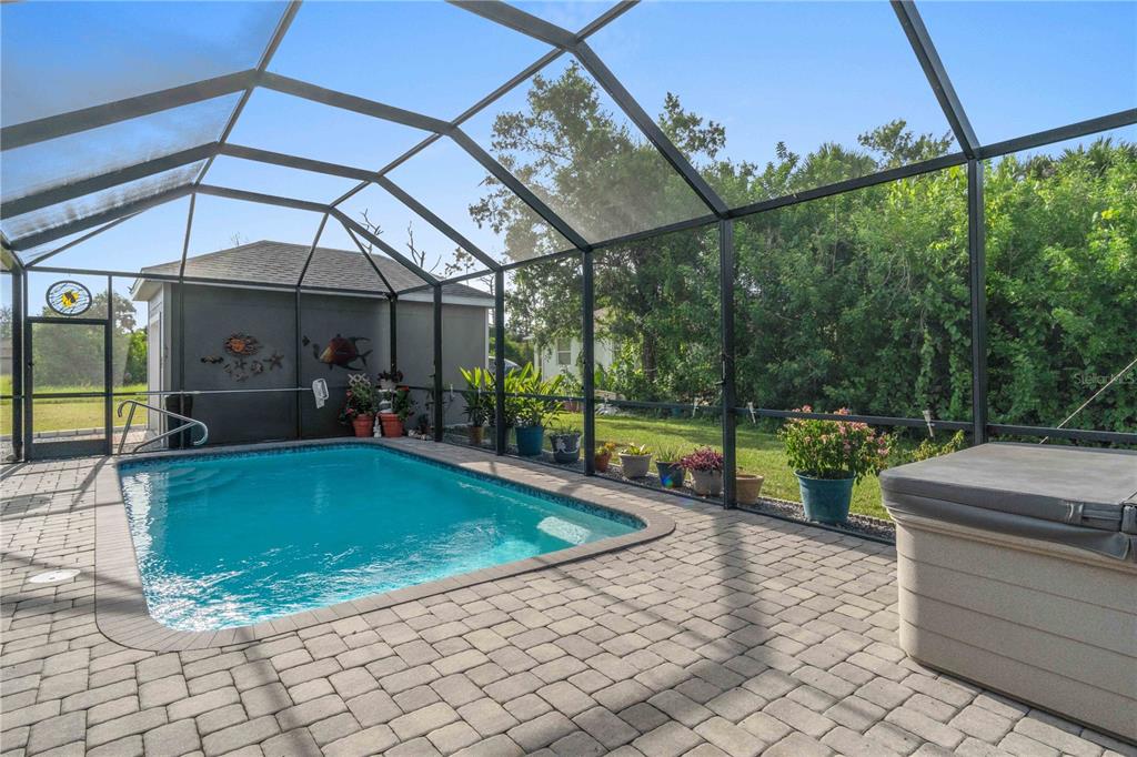 114 Venice Road Rotonda West, FL 33947 - Photo 39 of 88 a view of a swimming pool with a patio