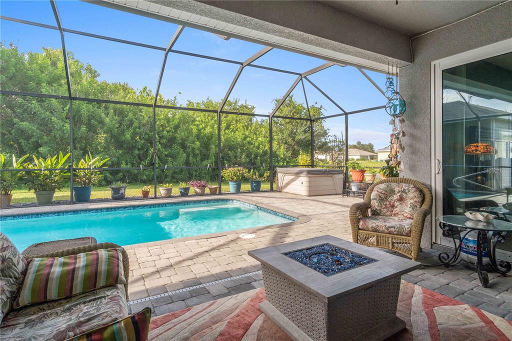 114 Venice Road Rotonda West, FL 33947 - Photo 43 of 88 a view of an outdoor kitchen and outdoor seating