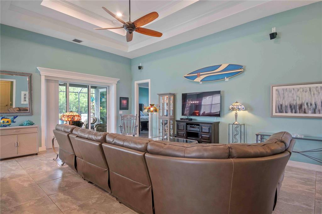 114 Venice Road Rotonda West, FL 33947 - Photo 46 of 88 a living room with furniture and a fireplace