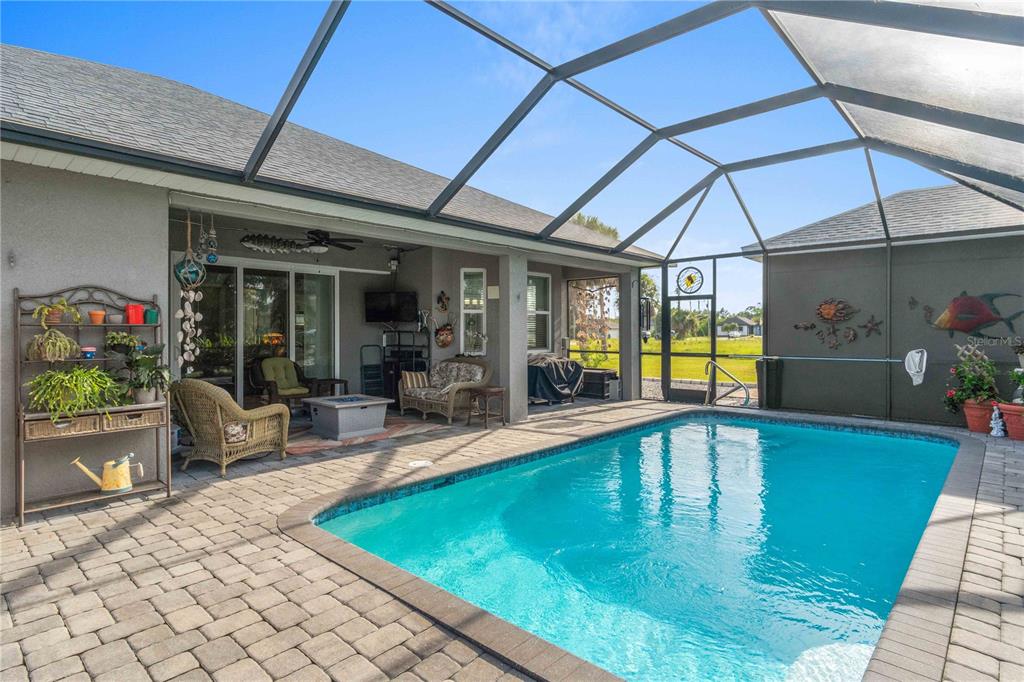 114 Venice Road Rotonda West, FL 33947 - Photo 5 of 88 a view of a swimming pool with a patio