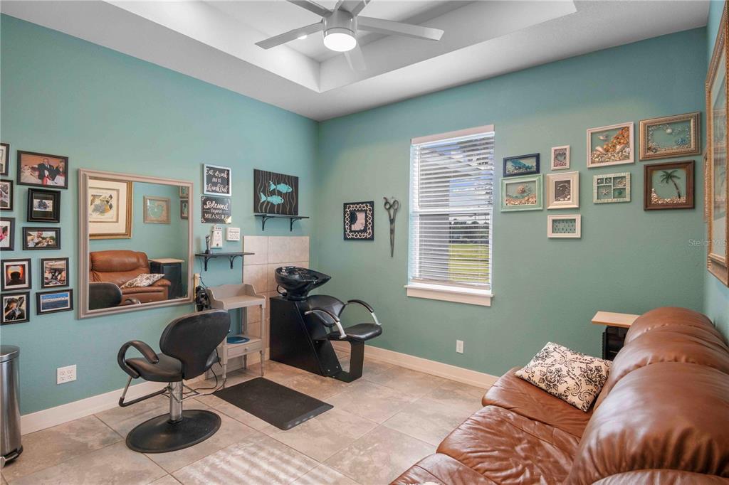 114 Venice Road Rotonda West, FL 33947 - Photo 80 of 88 a living room with furniture and a window