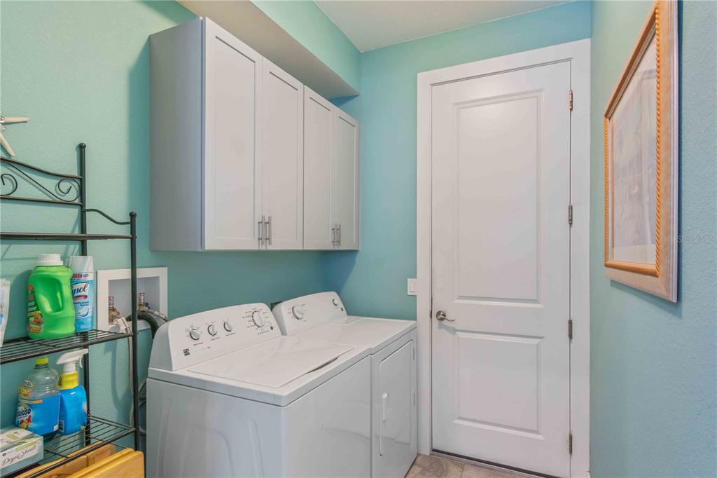 114 Venice Road Rotonda West, FL 33947 - Photo 81 of 88 a utility room with dryer and washer
