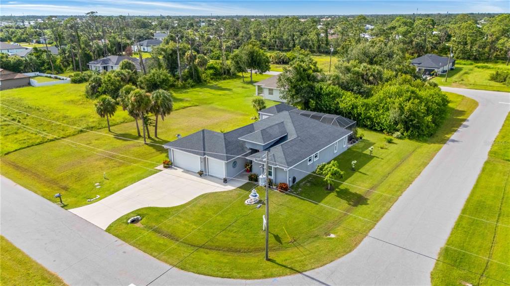 114 Venice Road Rotonda West, FL 33947 - Photo 9 of 88 a view of a swimming pool with a yard