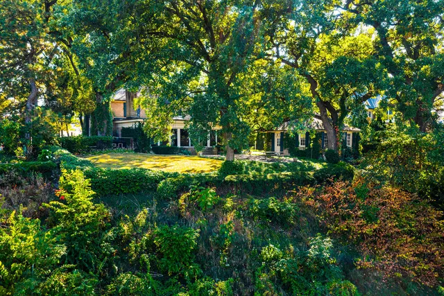 a view of entryway and hall with a front door