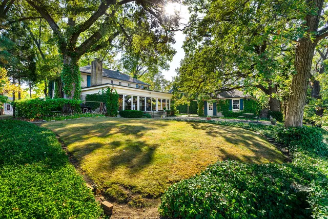 a view of livingroom with furniture and a fireplace