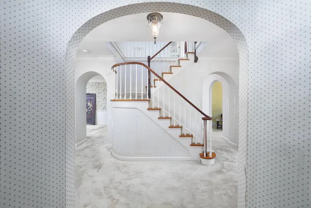 a bathroom with a sink a vanity and a mirror