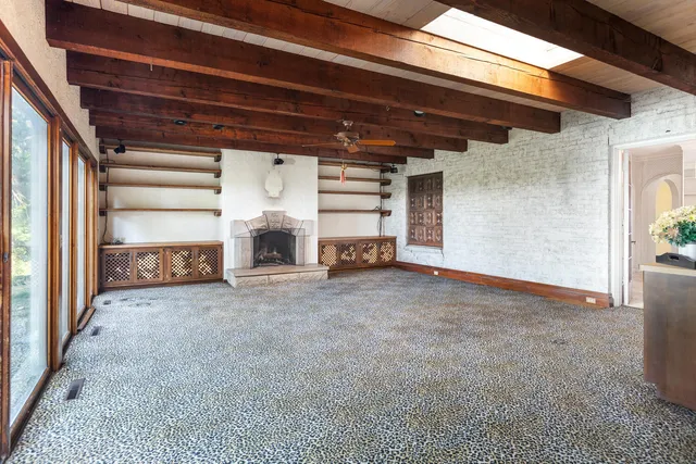 a view of a hallway with staircase