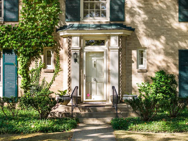a front view of a house with swimming pool