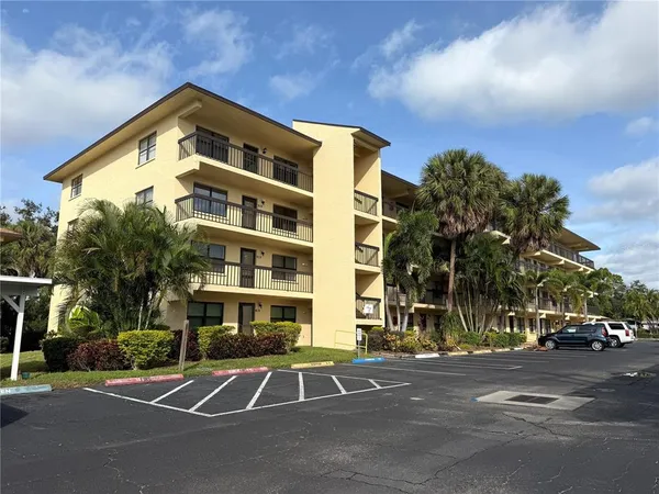 a front view of a building with street view