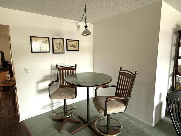 a view of a livingroom with furniture and a couch
