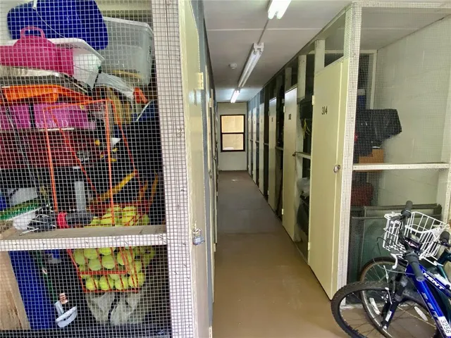 a view of swimming pool with seating space