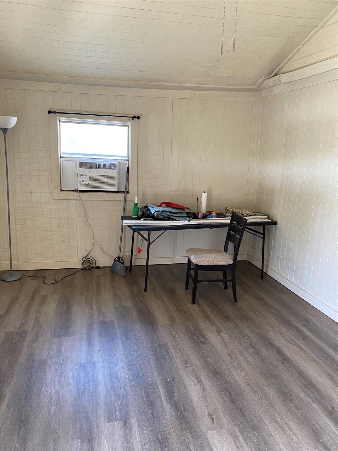 114 2nd Street San Leon, TX 77539 - Photo 13 of 14 a living room with furniture and a wooden floor