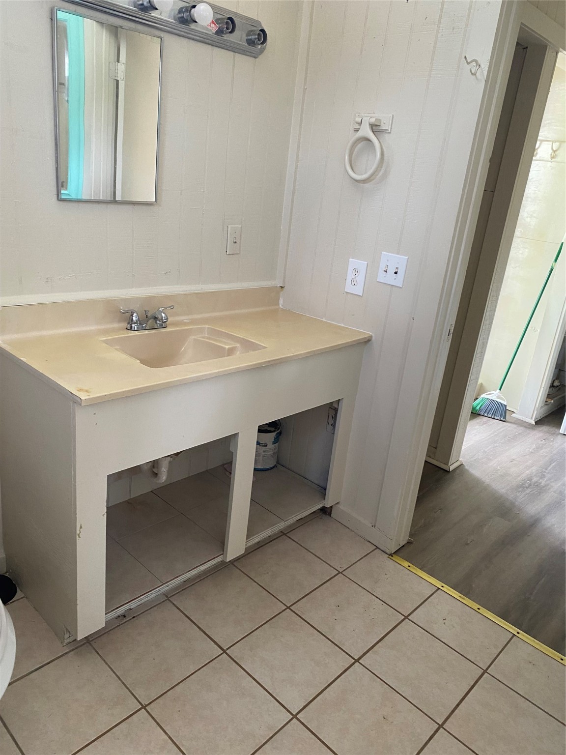 114 2nd Street San Leon, TX 77539 - Photo 8 of 14 a bathroom with a sink and a mirror