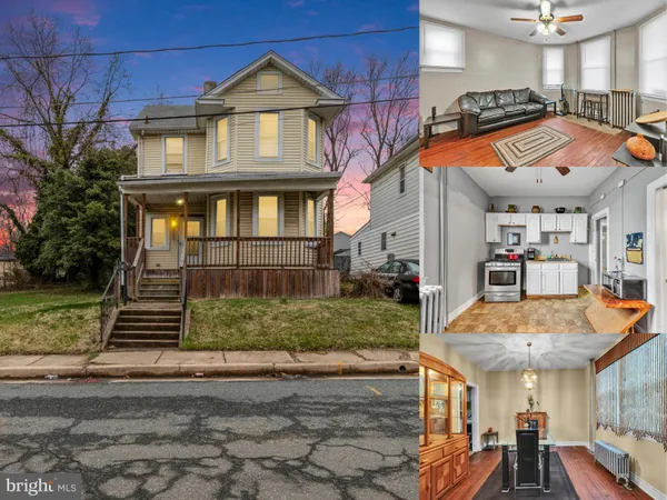 a view of multiple houses with a yard