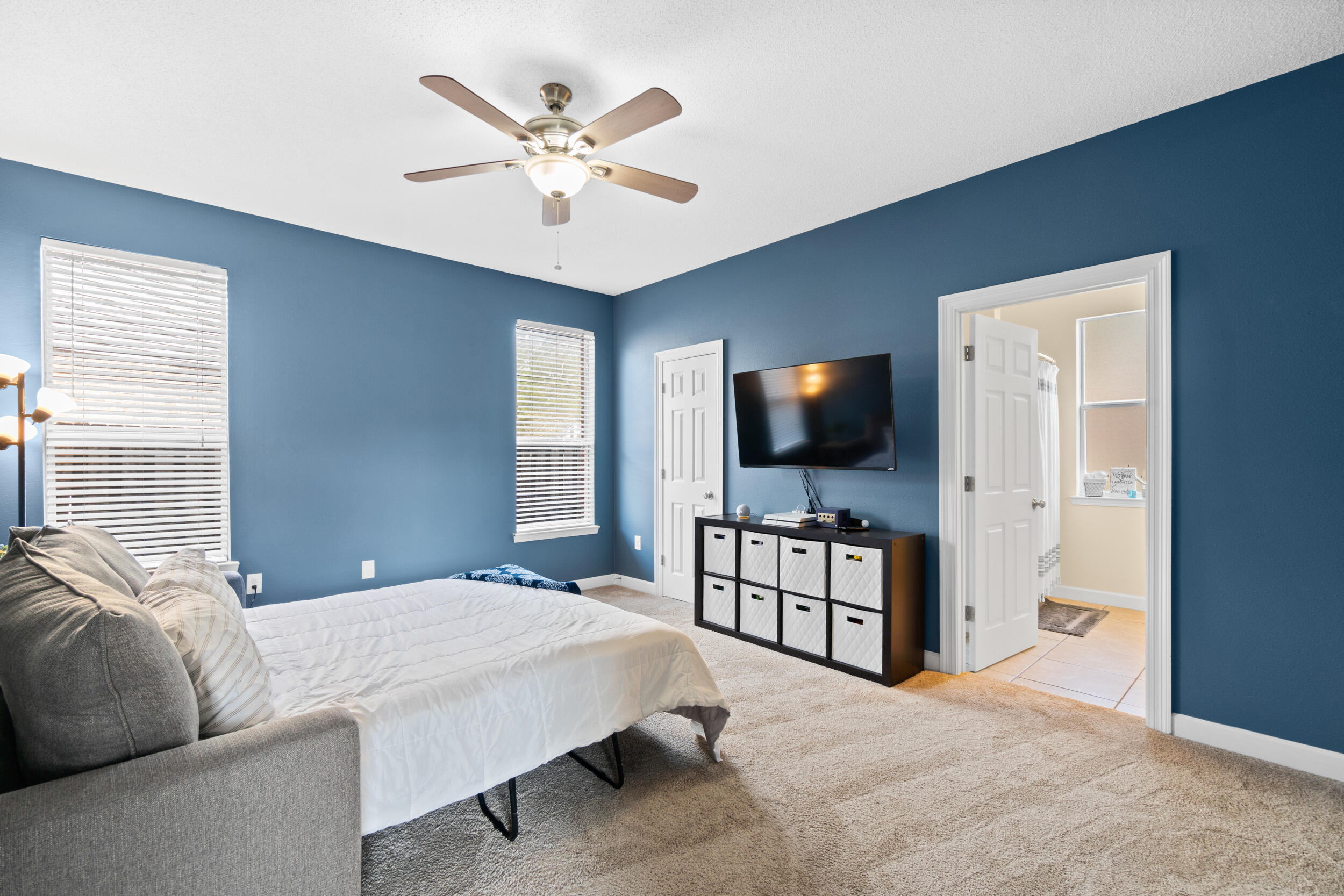 31 Corte Lago Santa Rosa Beach, FL 32459 - Photo 16 of 42 a bedroom with a bed and a flat screen tv