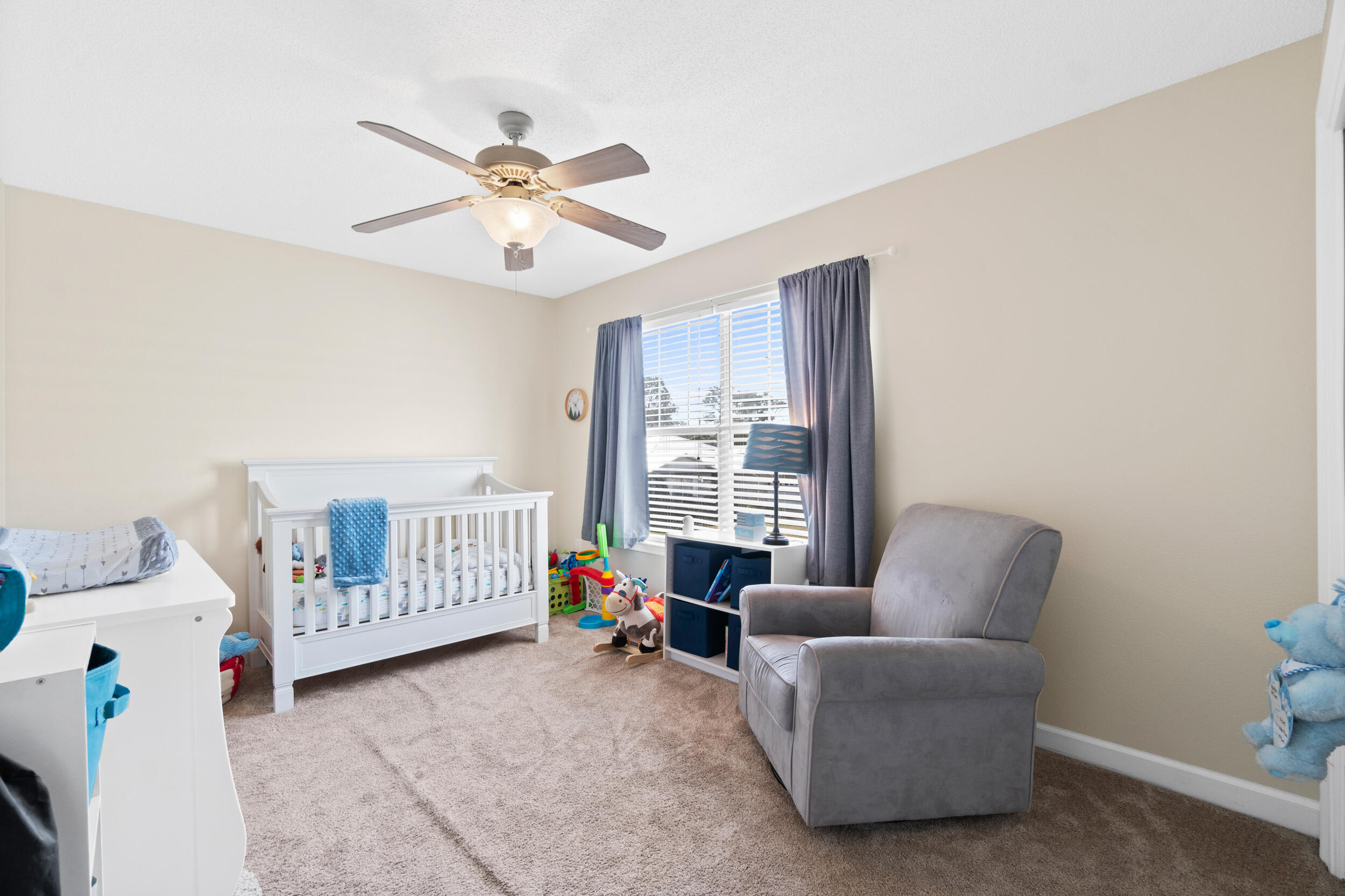 31 Corte Lago Santa Rosa Beach, FL 32459 - Photo 18 of 42 a bedroom with furniture and a large window