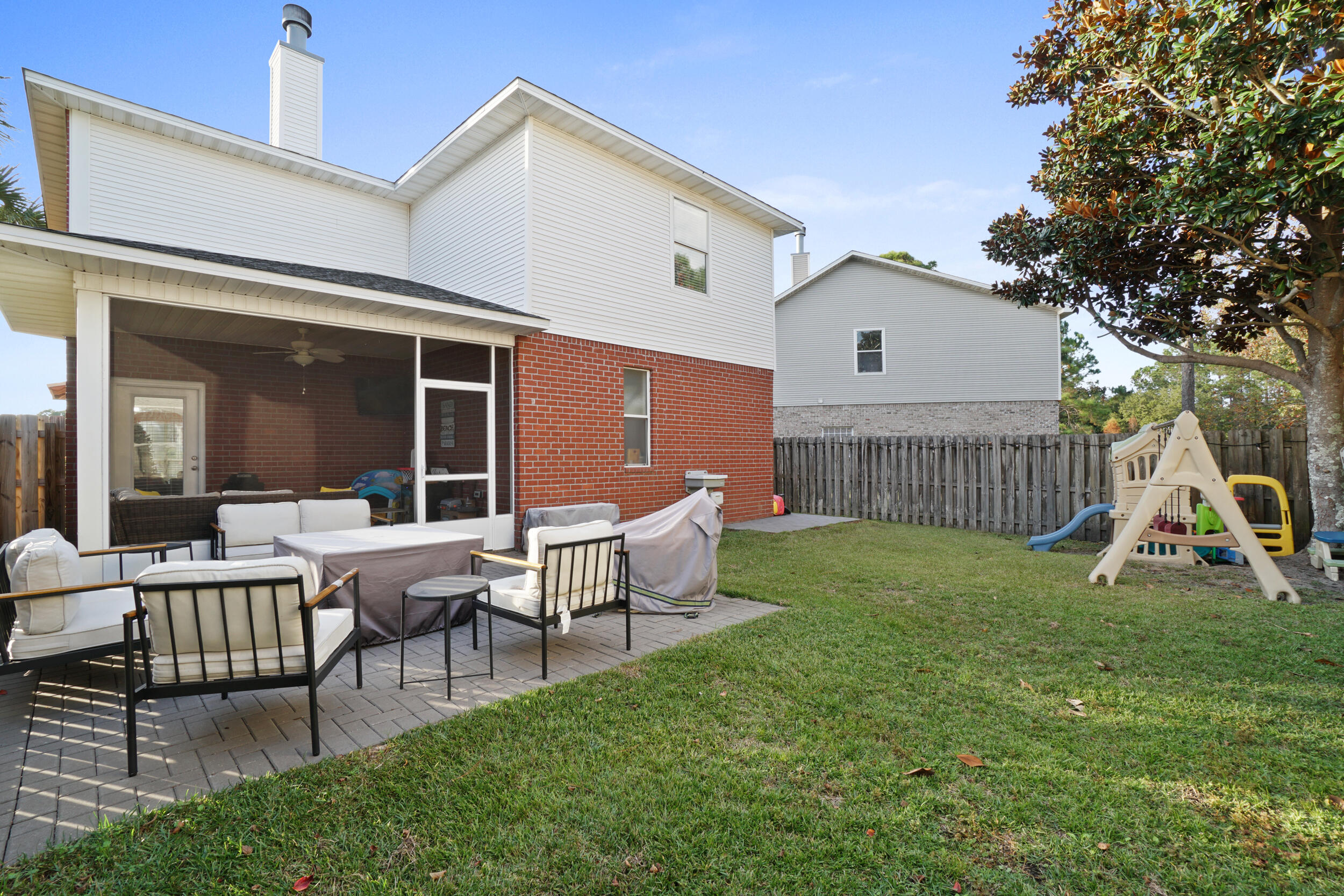 31 Corte Lago Santa Rosa Beach, FL 32459 - Photo 25 of 42 a view of a house with backyard and porch
