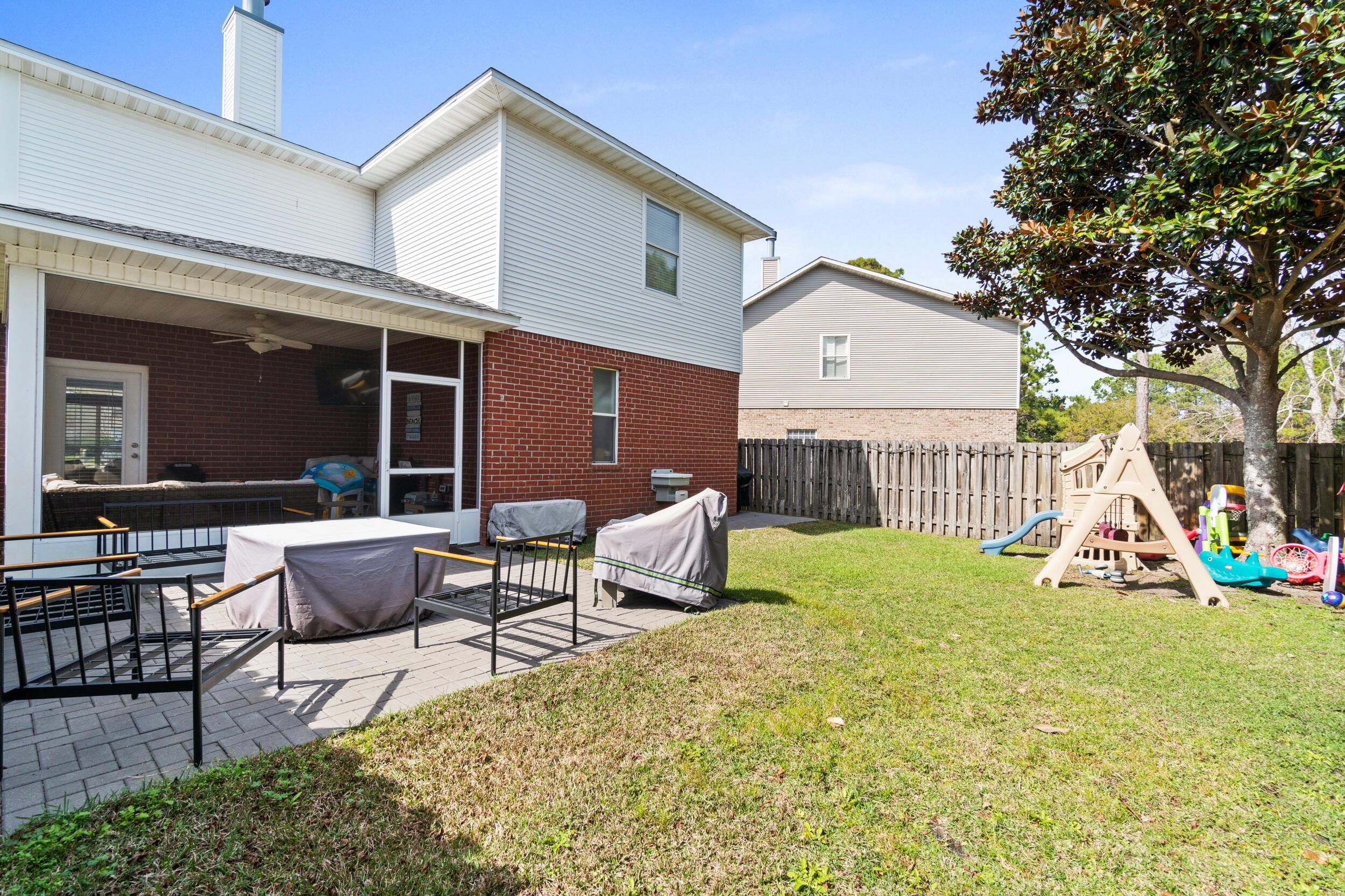 31 Corte Lago Santa Rosa Beach, FL 32459 - Photo 26 of 42 a view of house with backyard and outdoor seating