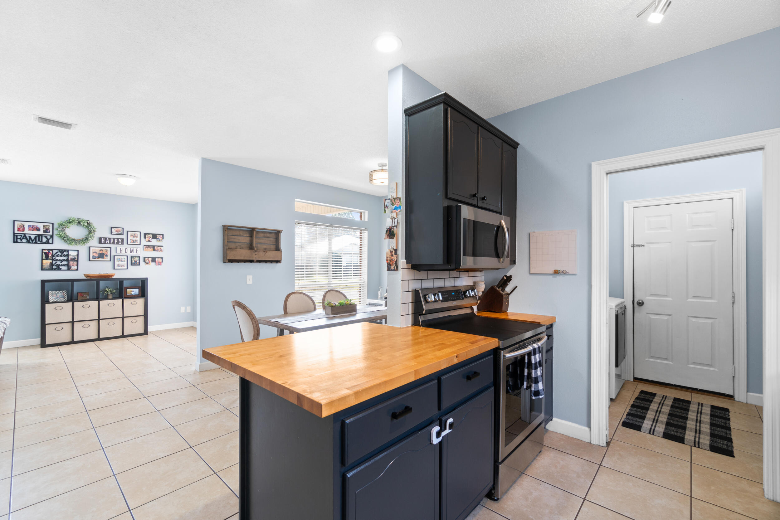 31 Corte Lago Santa Rosa Beach, FL 32459 - Photo 6 of 42 a kitchen with a sink a counter top space and cabinets