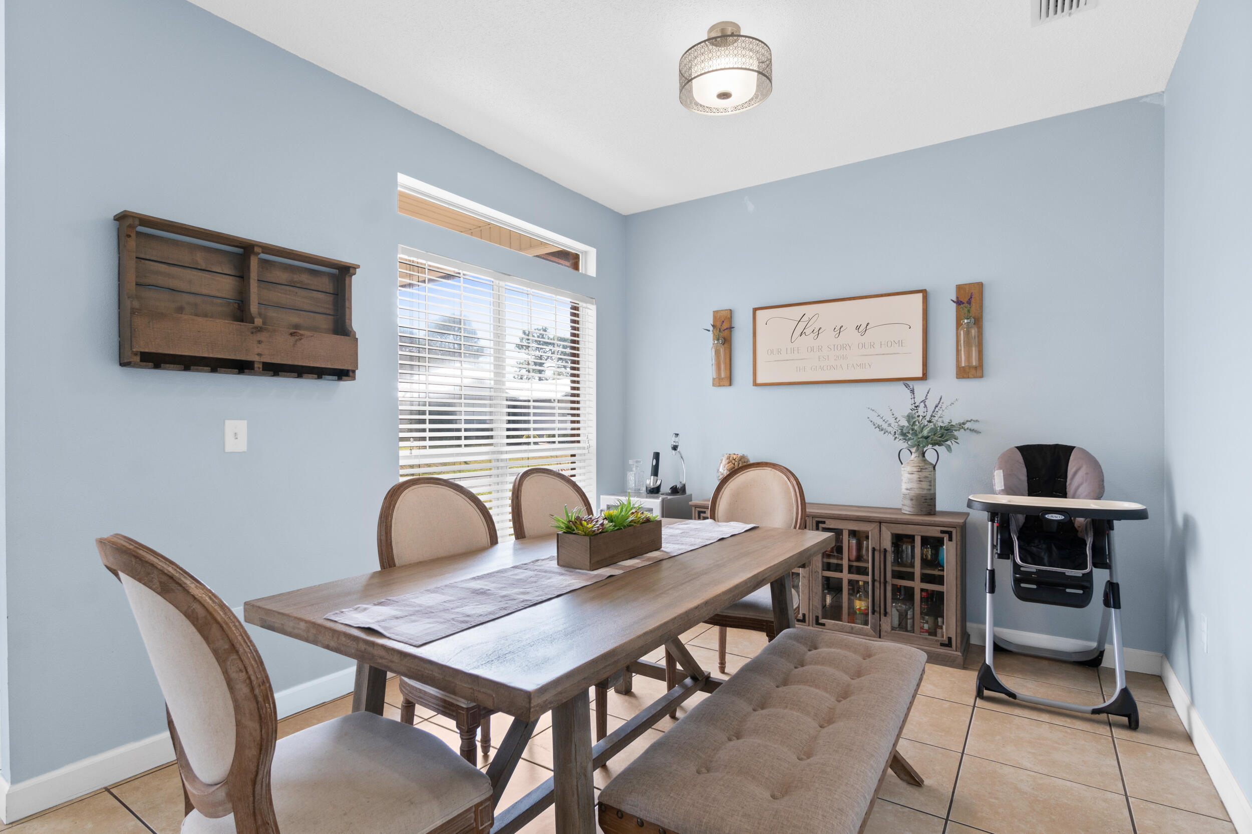 31 Corte Lago Santa Rosa Beach, FL 32459 - Photo 7 of 42 a view of a a dining room with furniture window and wooden floor