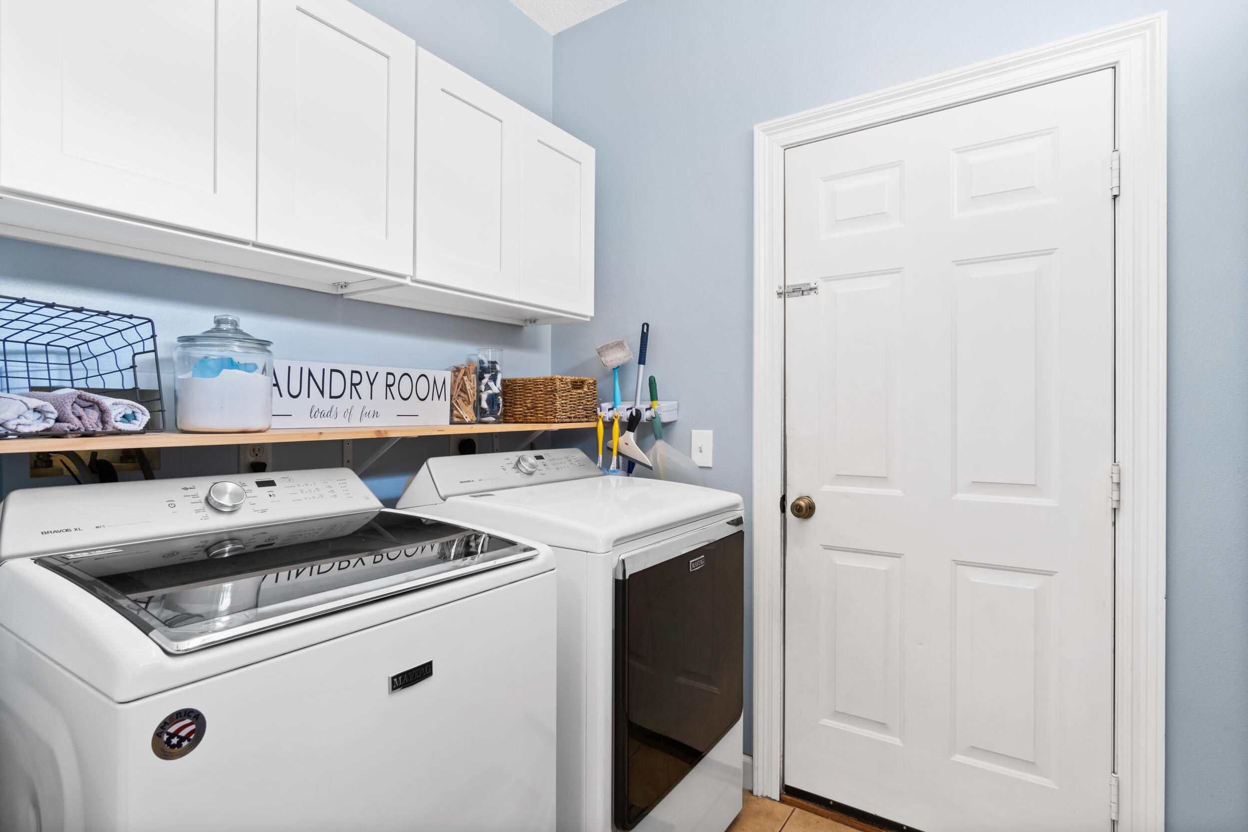 31 Corte Lago Santa Rosa Beach, FL 32459 - Photo 8 of 42 a utility room with dryer and washer