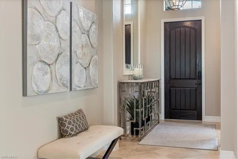 a entryway with a rug