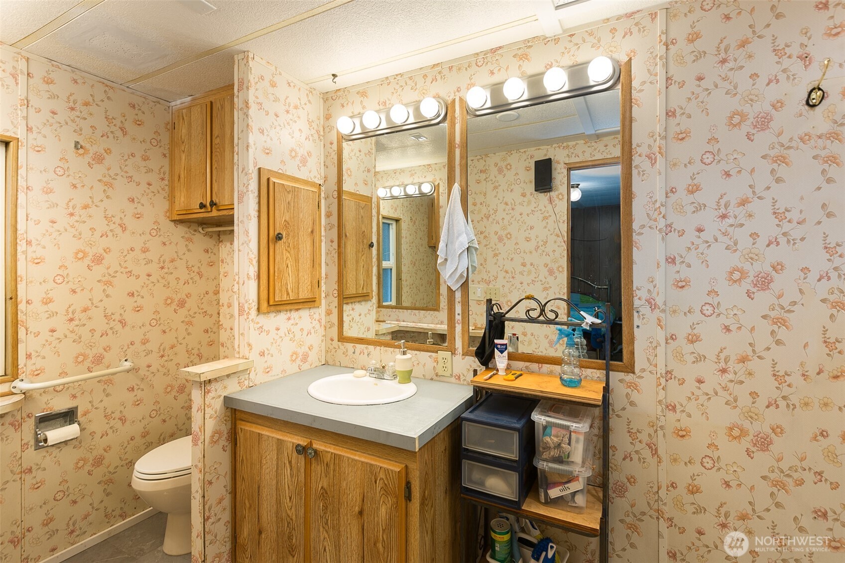 501 McCarver Road Port Angeles, WA 98362 - Photo 12 of 36 a bathroom with a sink a toilet and shower